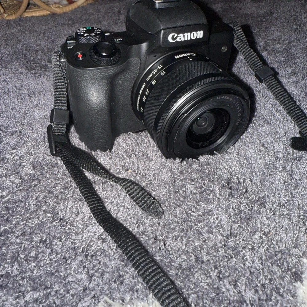 Canon Black DSLR Camera with Strap